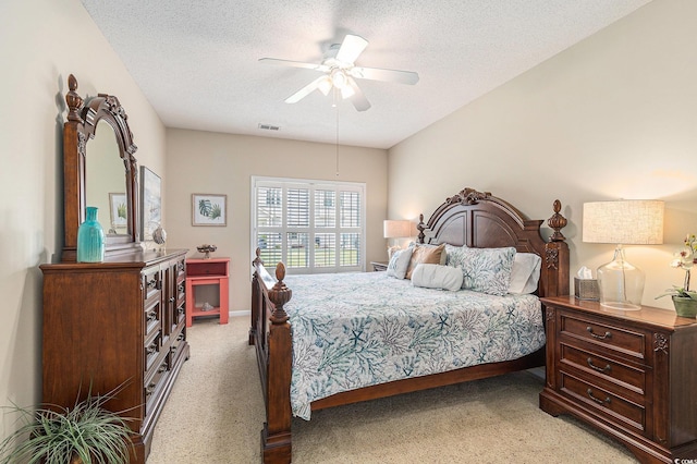 503 N 20th Ave N Unit 41D, North Myrtle Beach, SC 29582 - bedroom with light colored carpet, a textured ceiling, and ceiling fan
