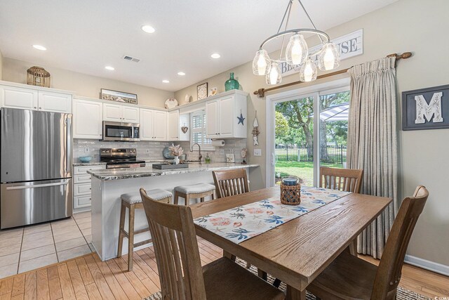 503 N 20th Ave N Unit 41D, North Myrtle Beach, SC 29582 - dining area with recessed lighting and light wood-type flooring