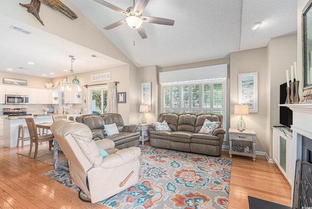 503 N 20th Ave N Unit 41D, North Myrtle Beach, SC 29582 - living room with light wood finished floors, a ceiling fan, lofted ceiling, and recessed lighting