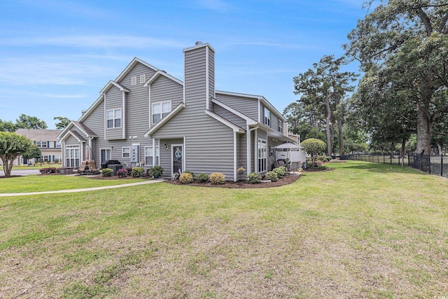 503 N 20th Ave N Unit 41D, North Myrtle Beach, SC 29582 - view of front facade with a chimney