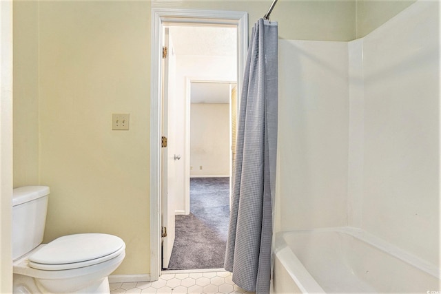 6703 Jefferson Pl Unit G5, Myrtle Beach, SC 29572 - bathroom featuring shower / bath combo with shower curtain and tile patterned flooring