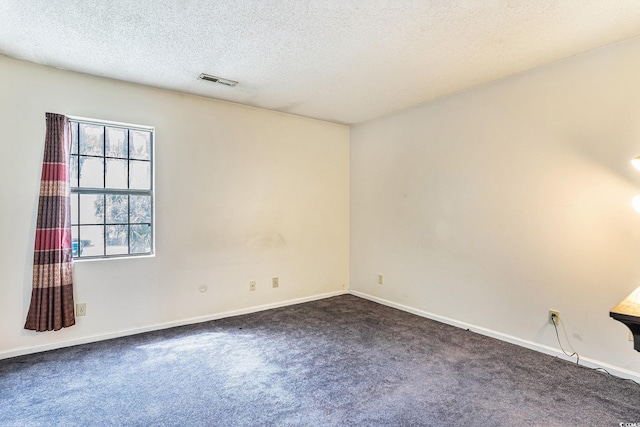 6703 Jefferson Pl Unit G5, Myrtle Beach, SC 29572 - unfurnished room featuring dark carpet and a textured ceiling