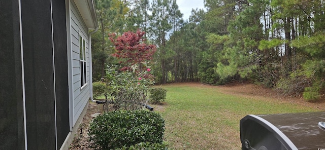 309 Outboard Dr, Murrells Inlet, SC 29576 - view of grassy yard with a wooded view