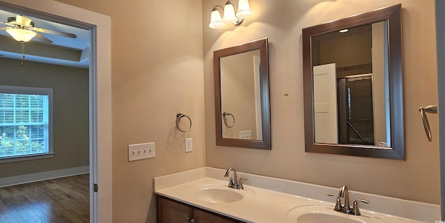 309 Outboard Dr, Murrells Inlet, SC 29576 - bathroom featuring wood finished floors, double vanity, and a ceiling fan