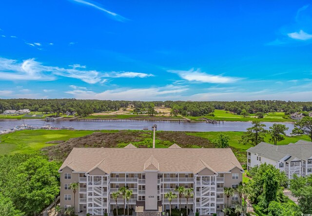 4366 Rivergate Ln Unit 306, Little River, SC 29566 - aerial view of a large body of water and a tree filled landscape