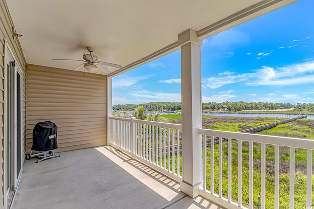 4366 Rivergate Ln Unit 306, Little River, SC 29566 - balcony featuring a ceiling fan and a water view