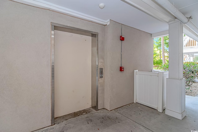 4366 Rivergate Ln Unit 306, Little River, SC 29566 - property entrance with elevator and stucco siding