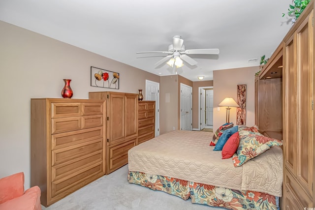 4366 Rivergate Ln Unit 306, Little River, SC 29566 - bedroom with light colored carpet and a ceiling fan