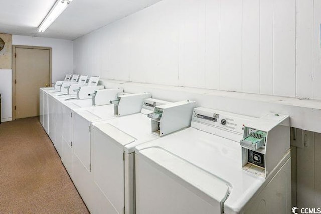 4201 N Ocean Blvd Unit 2M, North Myrtle Beach, SC 29582 - shared laundry room with washing machine and clothes dryer and light carpet