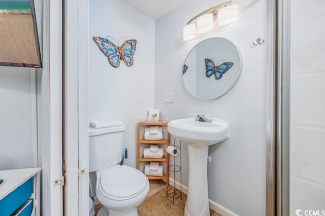 4201 N Ocean Blvd Unit 2M, North Myrtle Beach, SC 29582 - bathroom with toilet and tile patterned floors