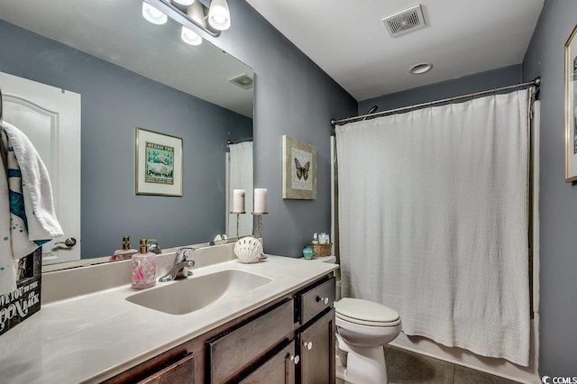 153 Goldenrod Cir Unit 7D, Little River, SC 29566 - bathroom featuring vanity, tile patterned floors, and a shower with curtain