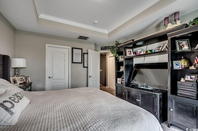 153 Goldenrod Cir Unit 7D, Little River, SC 29566 - bedroom with crown molding and a raised ceiling