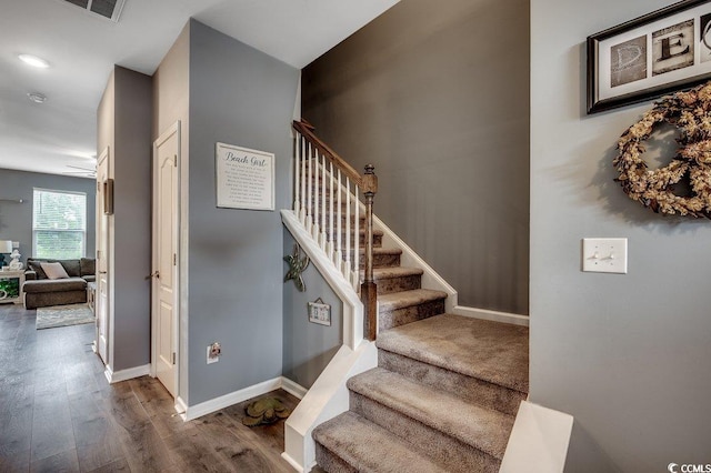 153 Goldenrod Cir Unit 7D, Little River, SC 29566 - stairway with wood finished floors and baseboards