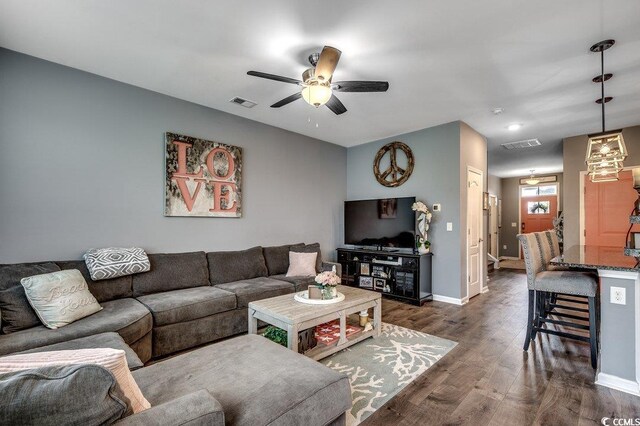 153 Goldenrod Cir Unit 7D, Little River, SC 29566 - living area featuring dark wood-style floors and ceiling fan