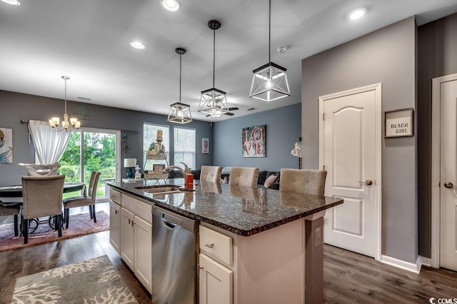 153 Goldenrod Cir Unit 7D, Little River, SC 29566 - kitchen with stainless steel dishwasher, a chandelier, recessed lighting, dark wood finished floors, and a kitchen island with sink