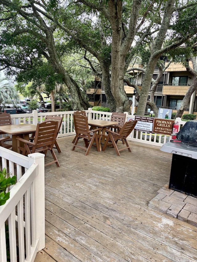 9501 Shore Dr Unit 323, Myrtle Beach, SC 29572 - wooden terrace featuring outdoor dining space