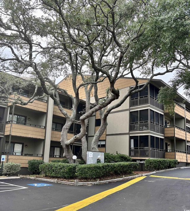 9501 Shore Dr Unit 323, Myrtle Beach, SC 29572 - view of property with uncovered parking