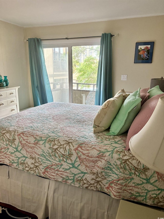 9501 Shore Dr Unit 323, Myrtle Beach, SC 29572 - bedroom featuring multiple windows and access to outside