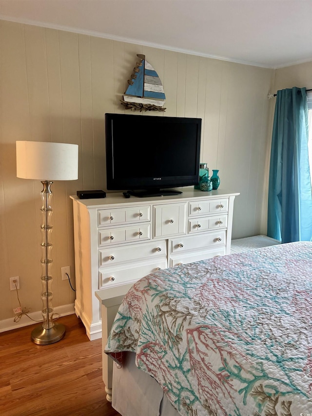 9501 Shore Dr Unit 323, Myrtle Beach, SC 29572 - bedroom with wood finished floors and ornamental molding