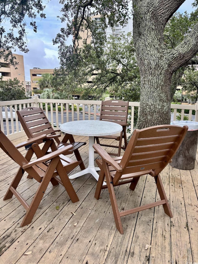 9501 Shore Dr Unit 323, Myrtle Beach, SC 29572 - wooden terrace featuring outdoor dining area