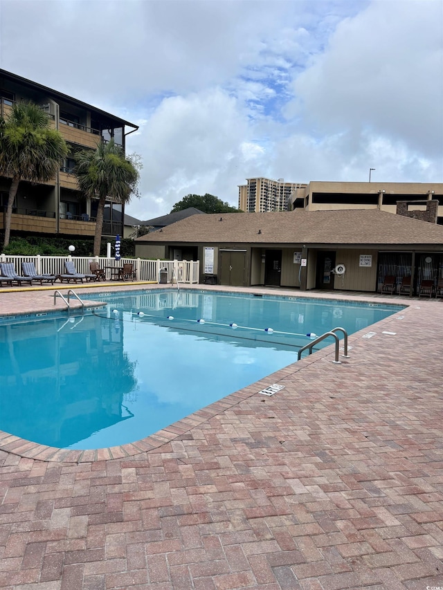 9501 Shore Dr Unit 323, Myrtle Beach, SC 29572 - community pool featuring a patio area