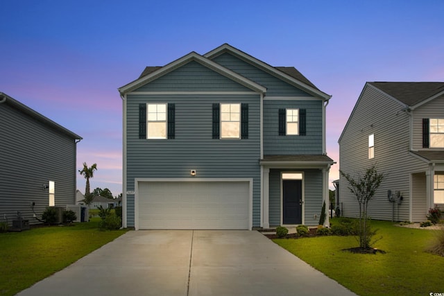 3657 Bells Lake Cir, Longs, SC 29568 - view of front of house featuring a garage, a yard, and concrete driveway
