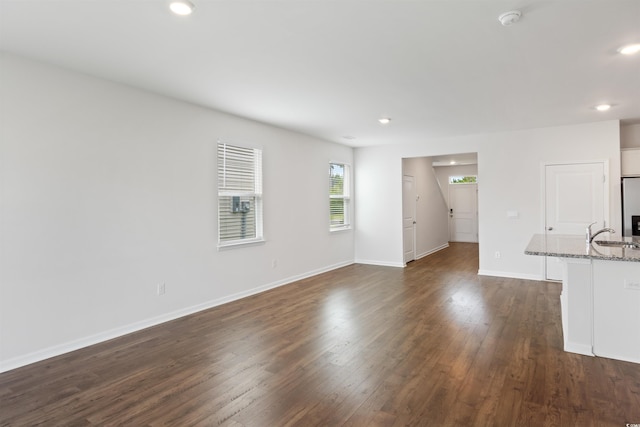 3657 Bells Lake Cir, Longs, SC 29568 - unfurnished living room with dark wood-style floors and recessed lighting