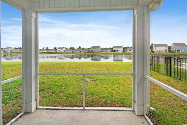 3657 Bells Lake Cir, Longs, SC 29568 - unfurnished sunroom with a water view, a residential view, and plenty of natural light