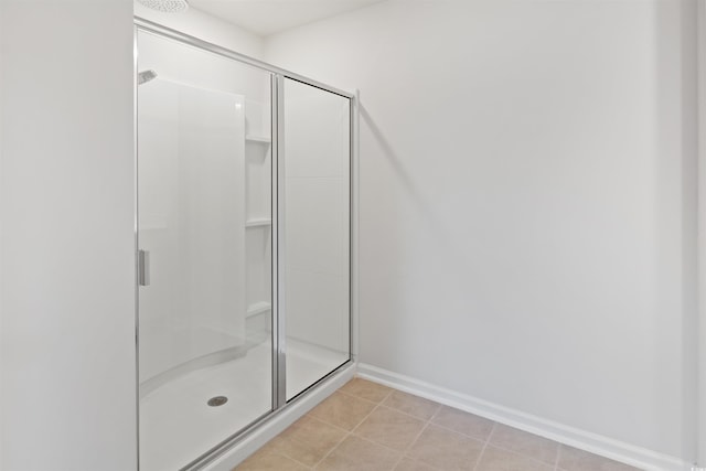 3657 Bells Lake Cir, Longs, SC 29568 - bathroom with a shower stall and tile patterned flooring