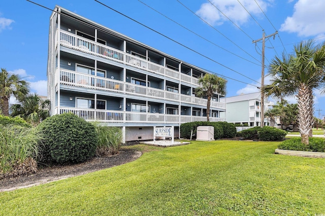 1210 N Ocean Blvd Unit 104, Surfside Beach, SC 29575 - view of apartment building / complex