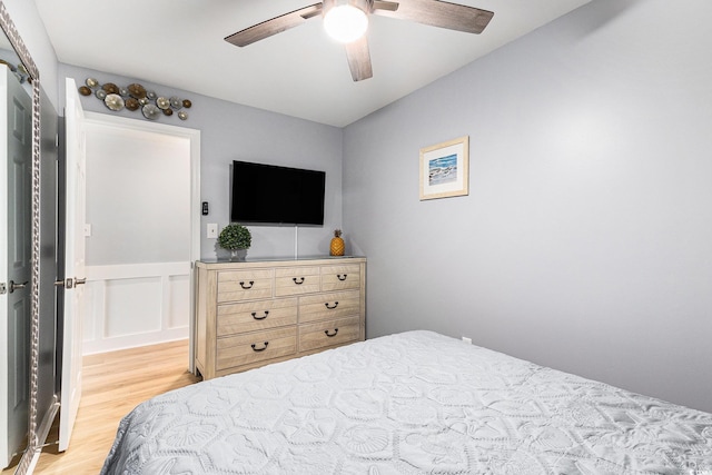 1210 N Ocean Blvd Unit 104, Surfside Beach, SC 29575 - bedroom with light wood-type flooring and ceiling fan