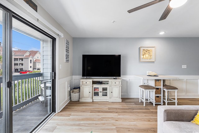 1210 N Ocean Blvd Unit 104, Surfside Beach, SC 29575 - living room with a ceiling fan, a decorative wall, wainscoting, light wood finished floors, and recessed lighting