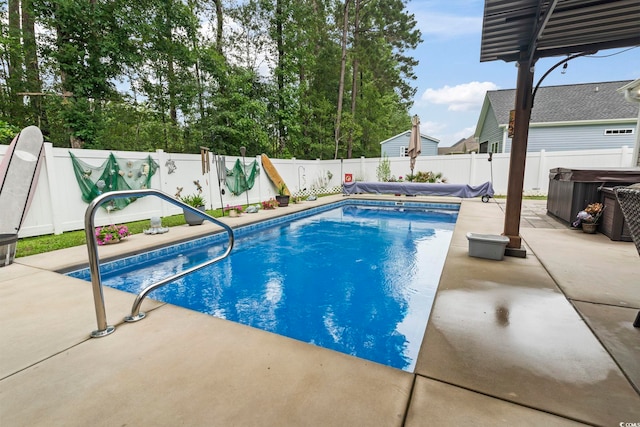 144 Baylee Cir, Aynor, SC 29544 - view of swimming pool featuring a covered hot tub, a patio, and a fenced backyard
