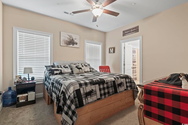 144 Baylee Cir, Aynor, SC 29544 - carpeted bedroom featuring a ceiling fan and connected bathroom
