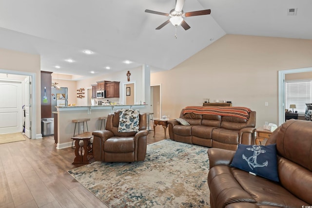 144 Baylee Cir, Aynor, SC 29544 - living area with a ceiling fan, lofted ceiling, light wood-type flooring, and recessed lighting