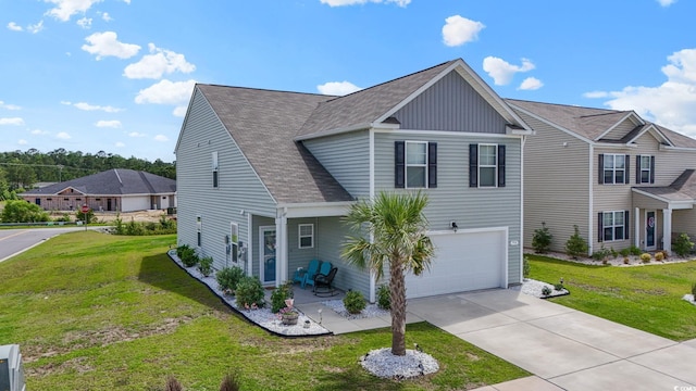 798 Woodland Farms Cir, Aynor, SC 29511 - traditional-style home featuring an attached garage, a front lawn, board and batten siding, concrete driveway, and a shingled roof
