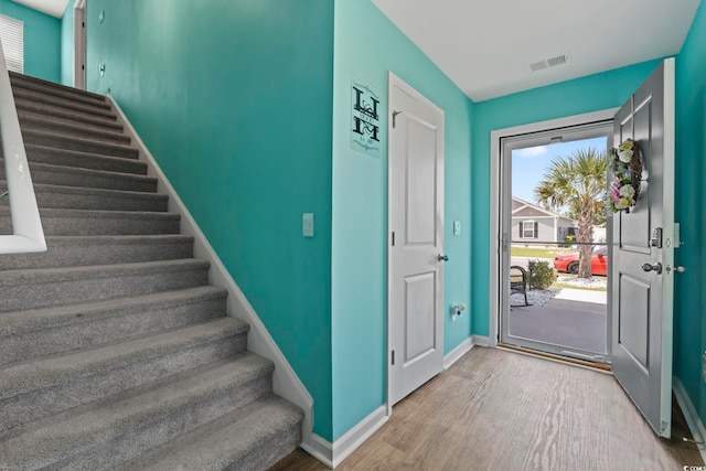 798 Woodland Farms Cir, Aynor, SC 29511 - foyer entrance with wood finished floors and stairway