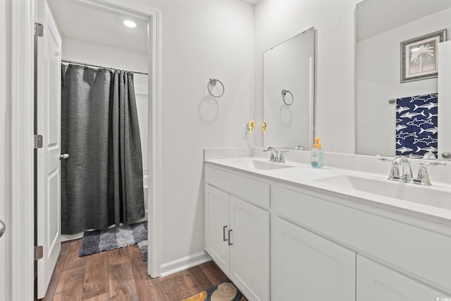 798 Woodland Farms Cir, Aynor, SC 29511 - full bathroom with double vanity, wood finished floors, and a shower with shower curtain