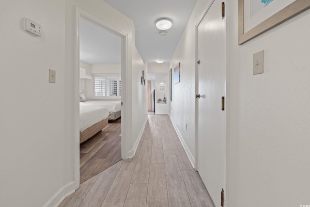 4800 S Ocean Blvd Unit 920, North Myrtle Beach, SC 29582 - hall featuring light wood finished floors and baseboards