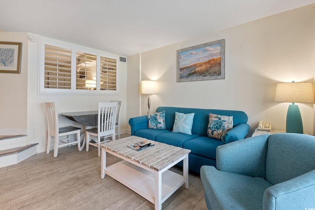 4800 S Ocean Blvd Unit 920, North Myrtle Beach, SC 29582 - living room with wood finished floors and baseboards