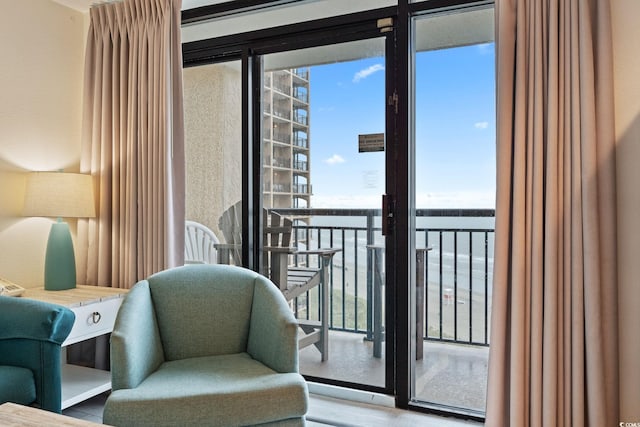 4800 S Ocean Blvd Unit 920, North Myrtle Beach, SC 29582 - living area featuring wood finished floors
