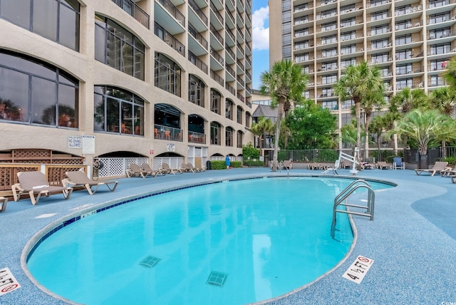 4800 S Ocean Blvd Unit 920, North Myrtle Beach, SC 29582 - community pool featuring a patio