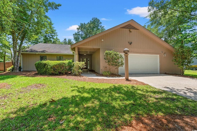 149 Old Cedar Loop, Pawleys Island, SC 29585 - view of front of property featuring gravel driveway and a garage