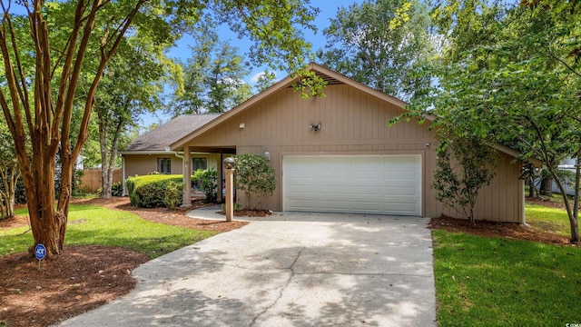 149 Old Cedar Loop, Pawleys Island, SC 29585 - view of front of property featuring concrete driveway and a garage