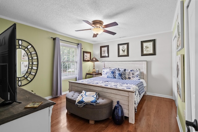 280 Morgan Ave, Little River, SC 29566 - bedroom featuring wood finished floors, ornamental molding, ceiling fan, and a textured ceiling