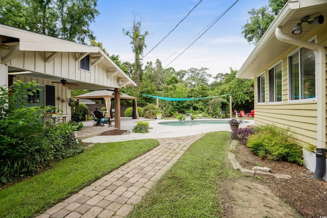 280 Morgan Ave, Little River, SC 29566 - view of yard with a gazebo, an outdoor pool, a patio, and a ceiling fan