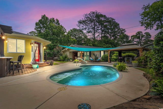 280 Morgan Ave, Little River, SC 29566 - pool at dusk with a patio, a gazebo, and an outdoor pool