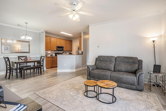 2005 Silvercrest Dr Unit 32F, Myrtle Beach, SC 29579 - living room with light wood-style flooring, ceiling fan, ornamental molding, and a chandelier