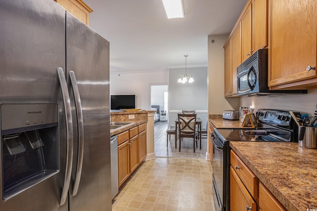 2005 Silvercrest Dr Unit 32F, Myrtle Beach, SC 29579 - kitchen featuring black appliances, crown molding, brown cabinets, a chandelier, and decorative light fixtures