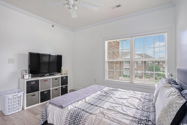 2005 Silvercrest Dr Unit 32F, Myrtle Beach, SC 29579 - bedroom with multiple windows, light wood-style floors, ornamental molding, and ceiling fan